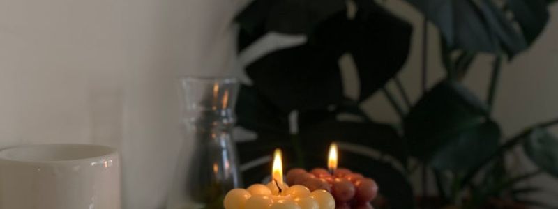 Candles and plants creating a peaceful atmosphere.